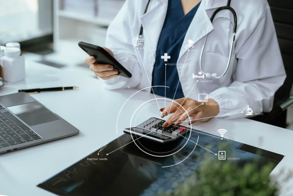 Billing staff manually reviewing explanation of benefits and posting payments into system