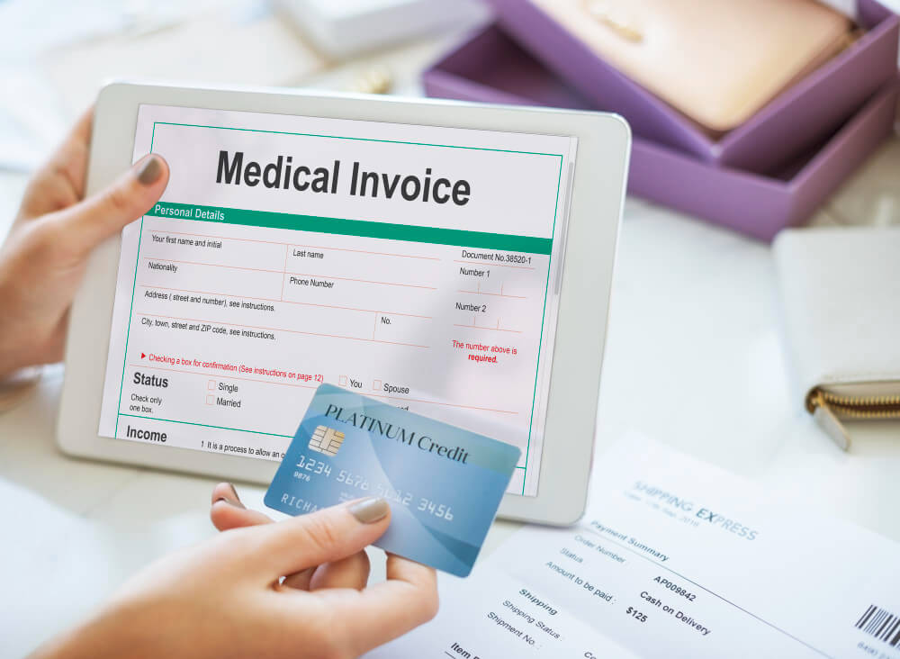 Healthcare insurance concept showing medical documents, calculator, and payment breakdown related to Explanation of Benefits