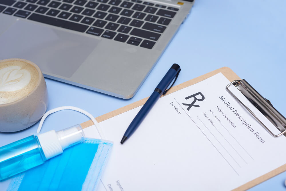 Front desk staff verifying patient details including name, date of birth, and insurance ID to prevent claim errors.